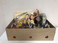 A box of Pez Dispensers, boxed Kansas Kid guns, model air craft,