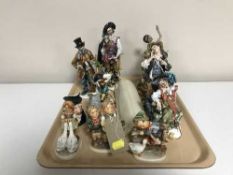 A tray of six Capo di Monte figures and two Capo di Monte scrolls and Three West German Goebel