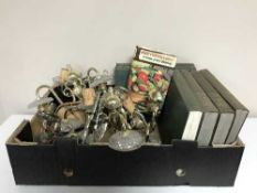 A box of brass and glass wall lights, six volumes Encyclopaedia, stone ware jar,