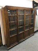 A 1920's oak four door bookcase