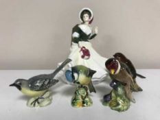 A Royal Doulton Pretty Lady's figure - Christmas Day 2008 HN 2510, four Beswick bird ornaments,