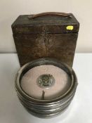 A cased pigeon timing clock