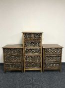 A pine and wicker five drawer chest and pair of matching bedside chests
