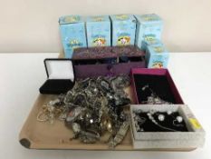 A tray of assorted costume jewellery and lady's wrist watches plus six boxed Flintstone