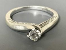 A 9ct white gold Canadian Ice diamond solitaire ring, in retail box with certification.