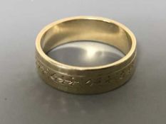 A 9ct gold band ring, 3.