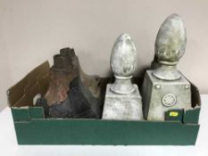 Four cast metal drain hoppers and pair of garden finials