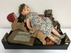 A box of early 20th century and later dolls, board games, boomerang tennis,