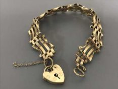 A 9ct gold gate bracelet, 9.