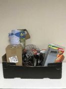 A box of out door spike lights, battery charger, handbag, telephones,