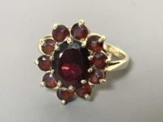 A 9ct gold garnet cluster ring, 3.