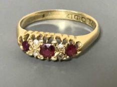 An 18ct gold ruby set ring, 2.