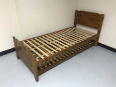 A 3' pine trundle bed