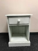 A painted pine bedside stand fitted a drawer