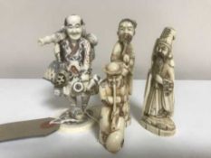 A Japanese netsuke - Gentleman with pipe, together with three further carved figures.