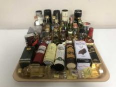 A tray of fine selection of whiskey miniatures - approx.