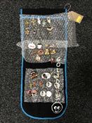 Thirty three Golly pin badges