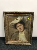 Simon Glucklich (German, 1863-1943): A head and shoulder portrait of a lady wearing a hat,