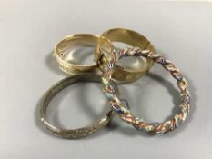 A quantity of silver and gold plated bangles