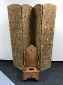 A child's rocking commode chair and a four way folding screen
