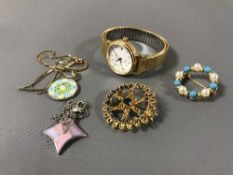 A pendant on 9ct gold chain, a silver pendant,