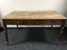 A Victorian mahogany library table fitted six drawers