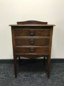 A mahogany three drawer music chest
