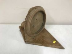 An antique pine wall bracket