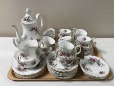 A tray containing a thirty-six piece Royal Albert Lavender Rose tea service