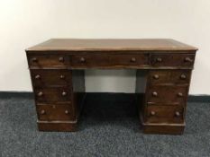 A Victorian leather topped writing desk