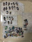 A collection of fifty-two Golly pin badges