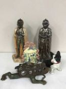 A tray of metal ware - two knight companion stands, metal door stop,