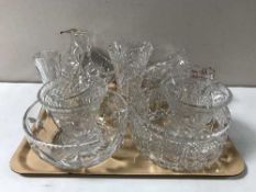 A tray containing assorted lead crystal and pressed glass including vases, fruit bowls,