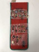 A collection of twenty-nine Golly pin badges