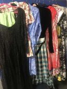 A quantity of vintage lady's clothes - sheepskin coat, dresses, fur coat,