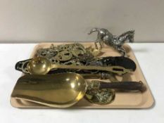A tray of brass scoop, large brass key, horse brasses,