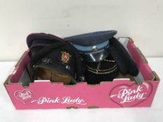 A box of six service caps including Queensland Fire Service, French Policeman's style hat,