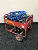 A Honda GX120 petrol generator with transformer leads