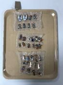 A collection of thirty-three Golly pin badges