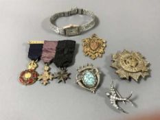 A 9ct gold and enamel Order of the Indian Empire miniature medal, together with several medals,