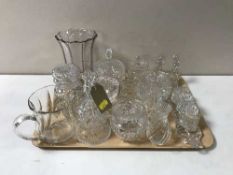 A tray containing assorted glassware to include preserve pots, glass hand bell, cruet set,