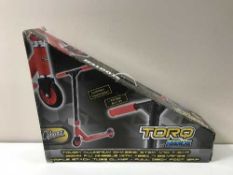 A Torq radical scooter, boxed.