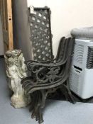 Two sets of cast metal bench ends and a back plate