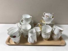 A tray containing a Bell china tea service together with one other