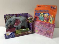 A box of Glitter Princess fuzzy felts, box of John Adams send and smile cards,