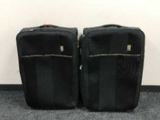 Four luggage cases, holdall and two bags by Samsonite,