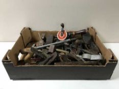 A box containing a quantity of vintage hand tools