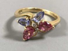 An 18ct gold butterfly ring set with diamonds and semi-precious stones