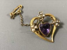 A 15ct gold Art Nouveau seed pearl and amethyst brooch