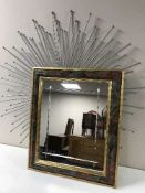 A contemporary metal framed sunburst mirror,